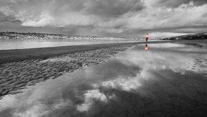 Preview wallpaper beach, sand, water, person, silhouette, black-and-white