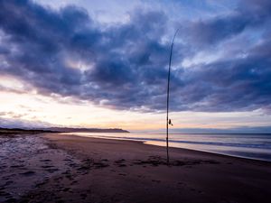 Preview wallpaper beach, sea, fishing rod, fishing, twilight