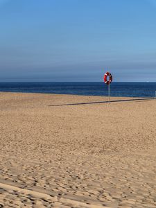 Preview wallpaper beach, sea, sand, lifebuoy, sky