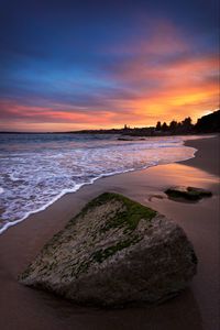 Preview wallpaper beach, sea, stones, sunset