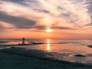 Preview wallpaper beach, sea, sun, sunset, water, sand