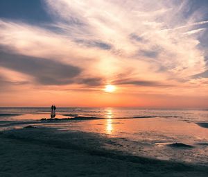 Preview wallpaper beach, sea, sun, sunset, water, sand