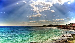 Preview wallpaper beach, sea, sun, beams, colors, coast, people