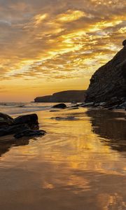 Preview wallpaper beach, sea, sunset, rocks, landscape, nature, summer