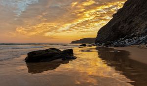 Preview wallpaper beach, sea, sunset, rocks, landscape, nature, summer