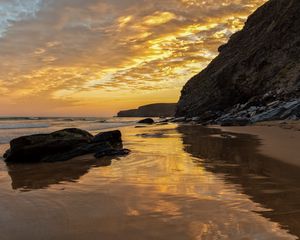 Preview wallpaper beach, sea, sunset, rocks, landscape, nature, summer