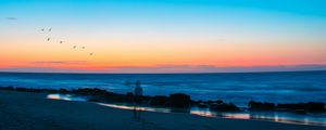 Preview wallpaper beach, silhouette, dusk, coast, sunset