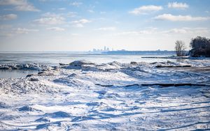 Preview wallpaper beach, snow, city, horizon, winter