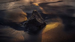 Preview wallpaper beach, stones, sunset, water, gleam