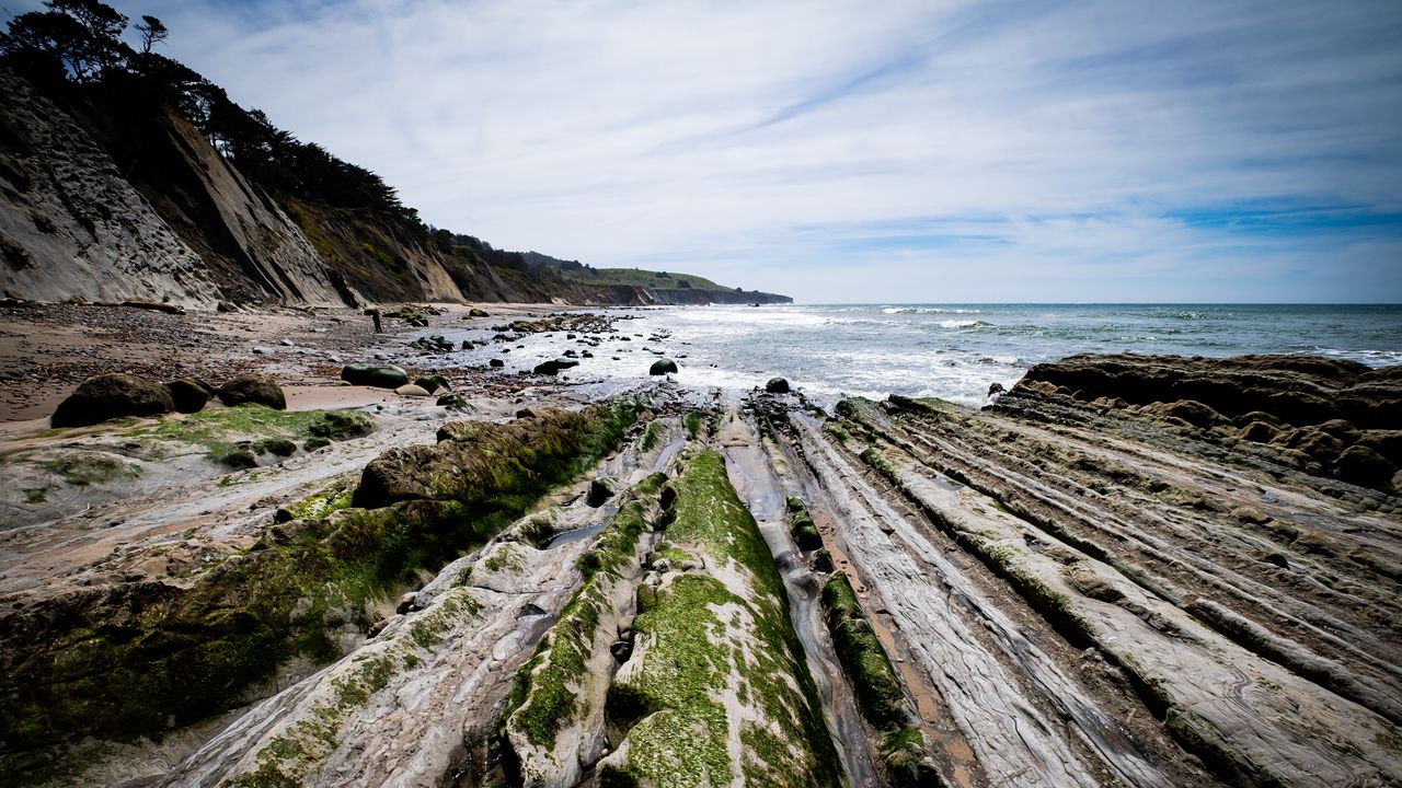 Wallpaper beach, stones, trees, mountains, sea, horizon, landscape