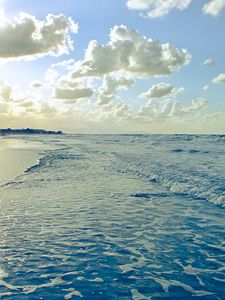 Preview wallpaper beach, sun, coast, sand, wet, foam, people, clouds, waves