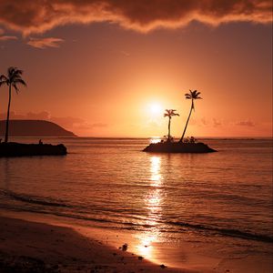 Preview wallpaper beach, sunset, island, sea, palm trees