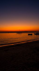 Preview wallpaper beach, sunset, pier, boats, dusk