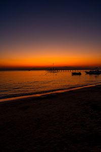 Preview wallpaper beach, sunset, pier, boats, dusk