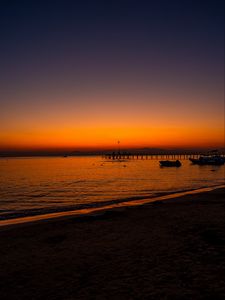 Preview wallpaper beach, sunset, pier, boats, dusk