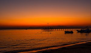 Preview wallpaper beach, sunset, pier, boats, dusk