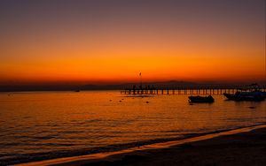 Preview wallpaper beach, sunset, pier, boats, dusk