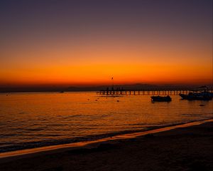 Preview wallpaper beach, sunset, pier, boats, dusk