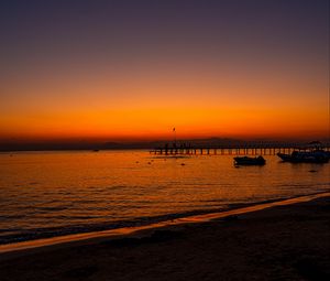 Preview wallpaper beach, sunset, pier, boats, dusk