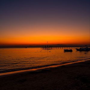 Preview wallpaper beach, sunset, pier, boats, dusk