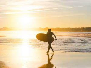 Preview wallpaper beach, surfing, board, sunset, sea, sun