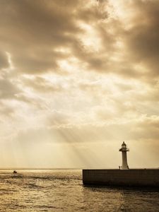 Preview wallpaper beacon, beams, sun, water, sea, sky