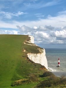 Preview wallpaper beacon, mountains, coast, breakage, sea