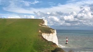 Preview wallpaper beacon, mountains, coast, breakage, sea