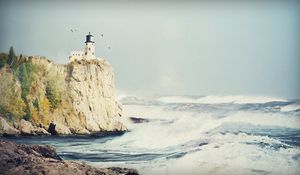 Preview wallpaper beacon, rock, birds, storm, sea