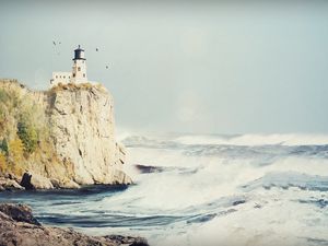 Preview wallpaper beacon, rock, birds, storm, sea