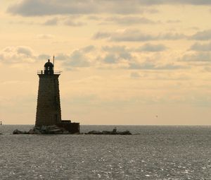 Preview wallpaper beacon, sea, sun, patches of light, ripples, evening