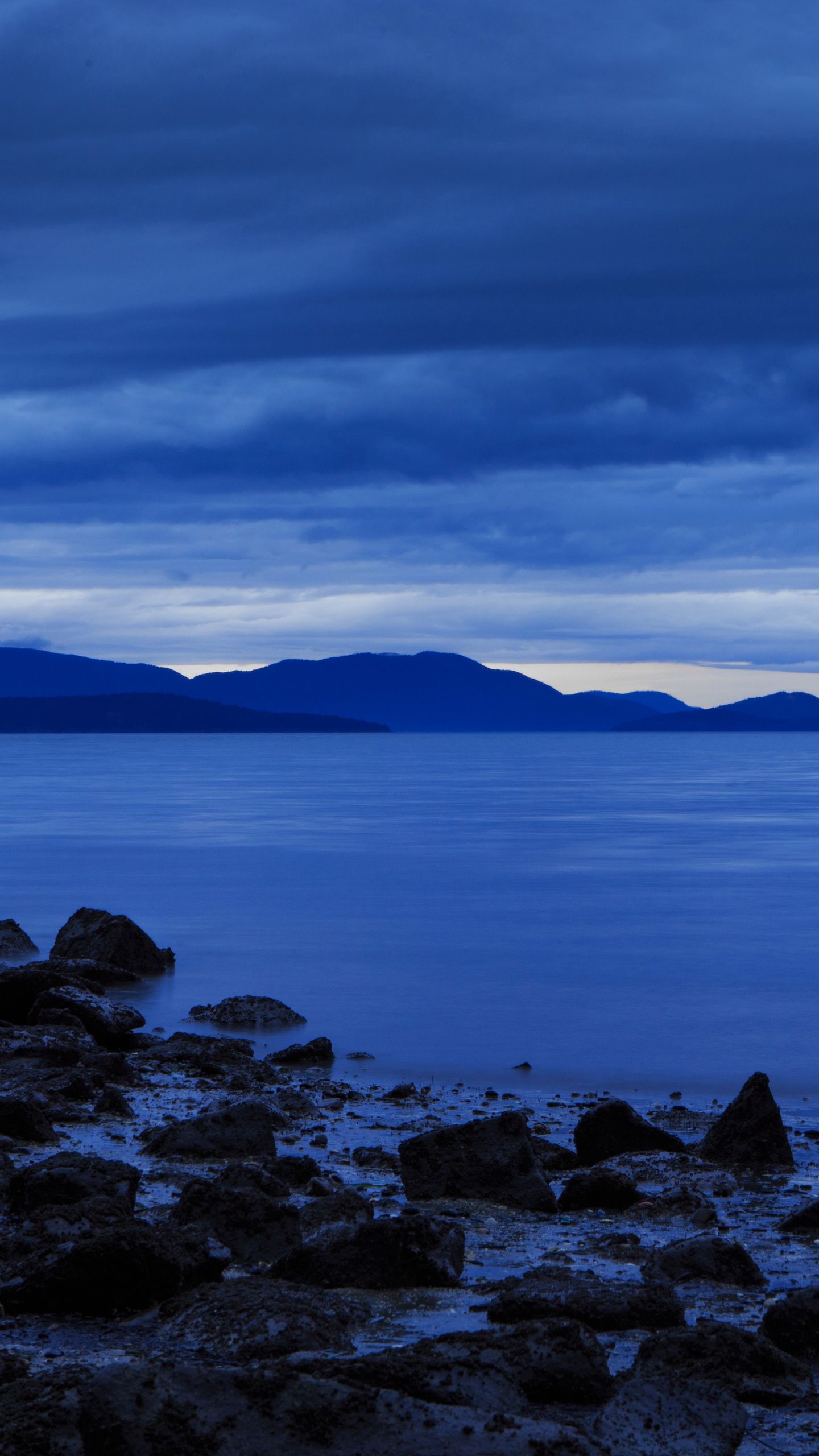 1440x2560 Wallpaper bellingham, united states, shore, stones, mountains