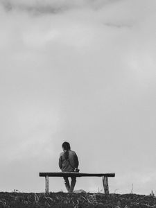 Preview wallpaper bench, man, bw, loneliness
