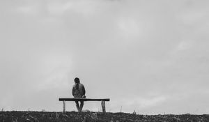 Preview wallpaper bench, man, bw, loneliness