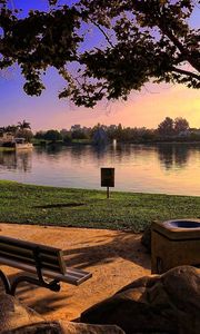 Preview wallpaper bench, park, lake, coast, stones, evening, lawn