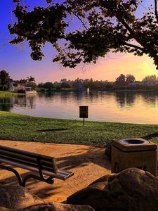 Preview wallpaper bench, park, lake, coast, stones, evening, lawn