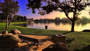 Preview wallpaper bench, park, lake, coast, stones, evening, lawn