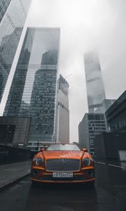 Preview wallpaper bentley continental gt, bentley, car, orange, front view, city, buildings