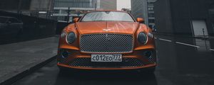 Preview wallpaper bentley continental gt, bentley, car, orange, front view, city, buildings