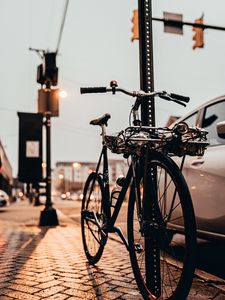 Preview wallpaper bicycle, black, sidewalk, street, city