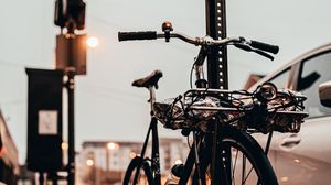 Preview wallpaper bicycle, black, sidewalk, street, city