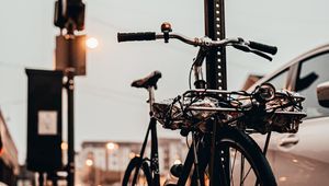 Preview wallpaper bicycle, black, sidewalk, street, city