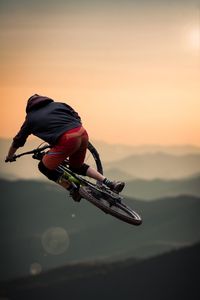 Preview wallpaper bicycle, cyclist, jump, helmet, stunt