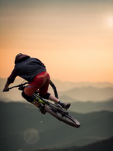 Preview wallpaper bicycle, cyclist, jump, helmet, stunt