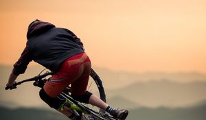 Preview wallpaper bicycle, cyclist, jump, helmet, stunt