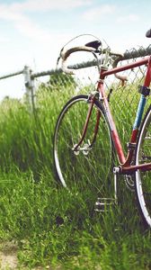 Preview wallpaper bicycle, fence, field, grass, summer