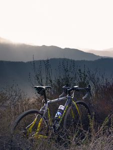 Preview wallpaper bicycle, grass, bushes