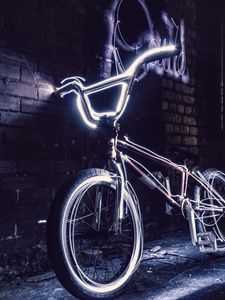 Preview wallpaper bicycle, neon, steering wheel, yard, evening