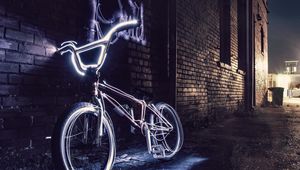 Preview wallpaper bicycle, neon, steering wheel, yard, evening