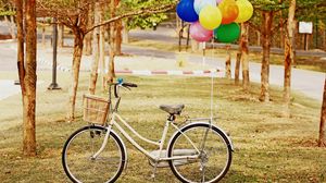 Preview wallpaper bicycle, park, balloons, grass